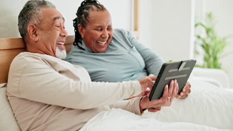 Smile,-tablet-and-mature-couple-in-bed
