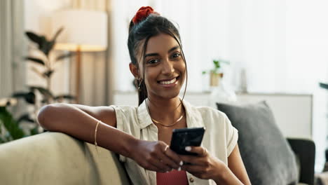 Woman,-phone-and-face-with-smile-on-sofa