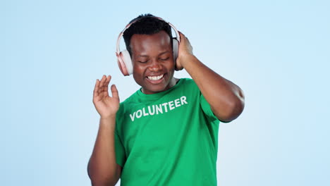 Music,-dance-and-smile-with-a-black-man-volunteer