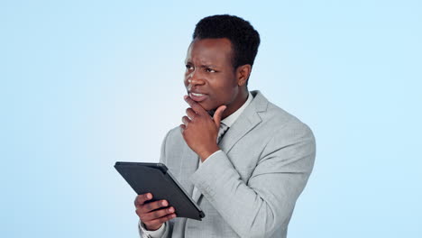 Confused,-thinking-and-business-man-with-tablet