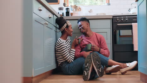 Kitchen-floor,-tea-cup-and-black-couple-smile