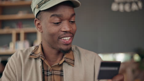 Black-man-in-coffee-shop-with-smile