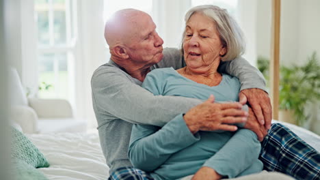 Elderly-couple,-hug-and-kiss-in-bedroom