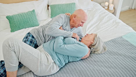 Love,-happy-and-senior-couple-on-bed-with-romance