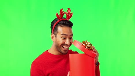Christmas,-gift-and-happy-man-in-green-screen