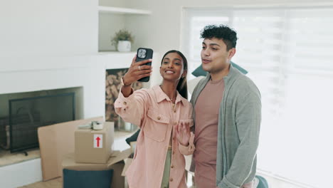 Couple,-video-call-and-happy-together-in-new-home