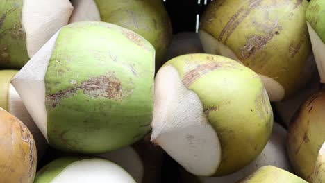 Stack-of-fresh-coconut-display-for-sale