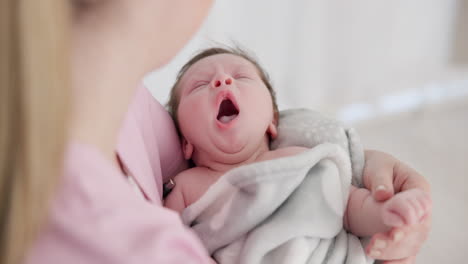 Baby,-yawn-and-calm-with-tired-newborn