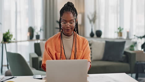 Black-woman,-typing-in-home-office