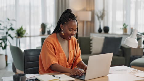 Black-woman,-excited-in-home-office