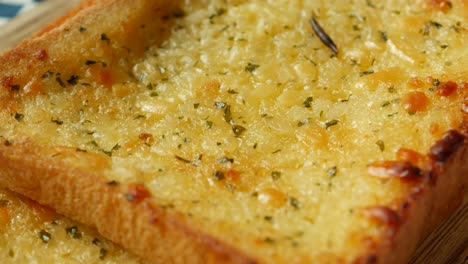 Garlic-bread-on-a-plate-on-table-,