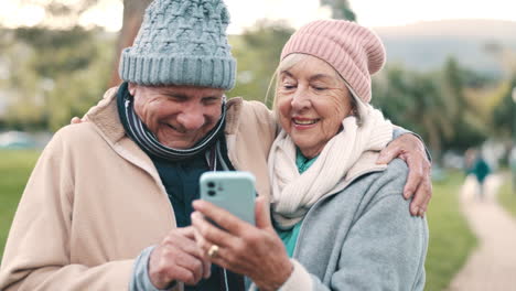 Park,-phone-and-senior-couple-walking-outdoors
