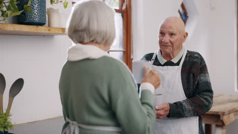 Coffee,-conversation-and-senior-couple-in-kitchen