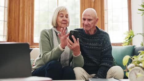 Phone,-search-and-happy-senior-couple-on-a-sofa