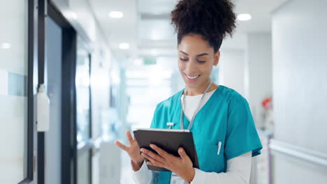 Hospital,-woman-and-doctor-with-a-tablet