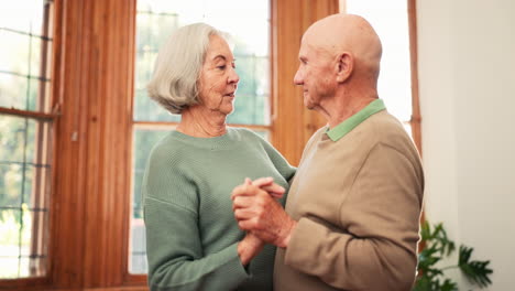 Senior-couple,-love-and-dance-to-music-in-home