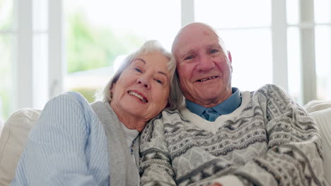 Love,-smile-and-face-of-senior-couple-on-a-sofa