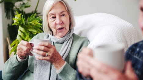 Nurse,-coffee-and-senior-couple-in-home-living