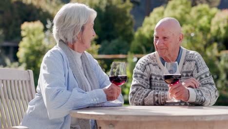 Senior-couple,-toast-and-wine-in-garden