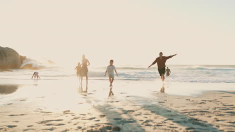 Beach,-happy-family-parents-and-children-running