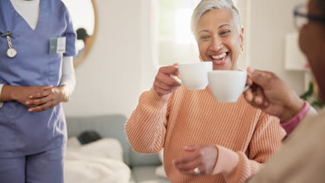 Caregiver,-coffee-or-cheers-with-elderly-women