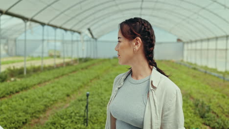 Woman,-face-and-smile-in-greenhouse
