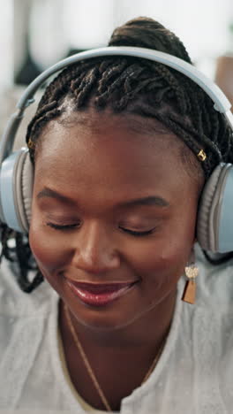 Music,-headphones-and-black-woman-on-laptop
