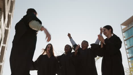 Graduation-cap,-group-and-students-throw-in-air