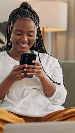 Woman,-laughing-or-typing-on-phone-on-sofa