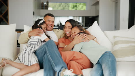 Family,-hug-and-conversation-on-couch