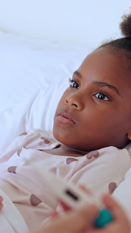 Sick,-bedroom-or-black-girl-with-thermometer