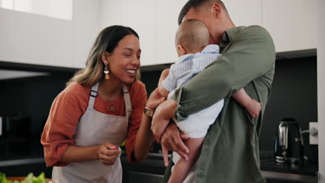 Baby,-smile-and-a-family-cooking-in-the-kitchen