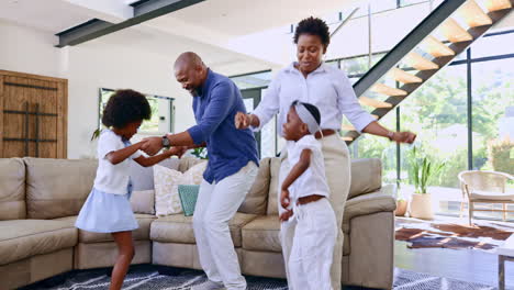 Happy,-living-room-and-parents-dance-with-kids