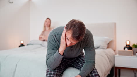 Man,-stress-and-conflict-of-couple-in-bedroom