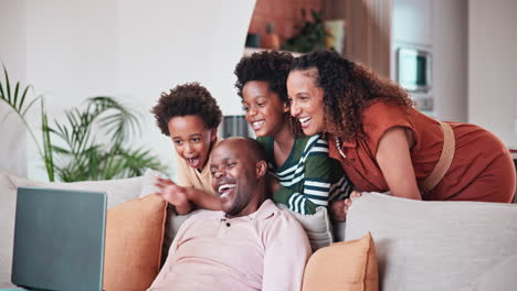 Black-family,-laptop-for-video-call