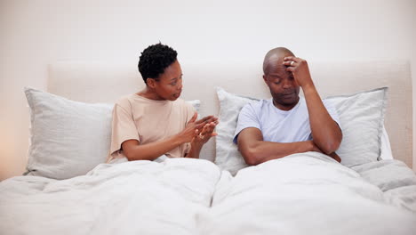 Black-couple,-fight-and-argument-in-bedroom