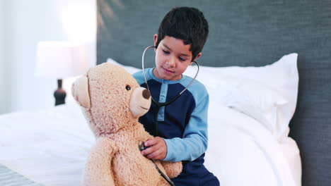 Boy-child,-stethoscope-and-play-with-teddy-bear