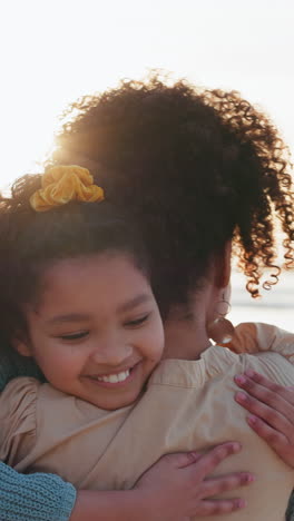 Running,-hug-and-mother-and-daughter-at-a-beach