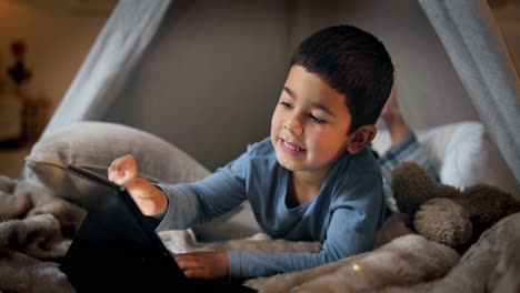 Tablet,-games-and-a-boy-in-a-tent-the-bedroom