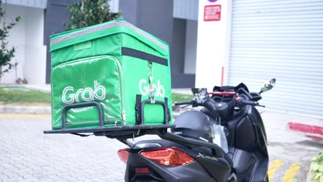 Singapore-1-june-2022-grab-food-logo-on-delivery-bag