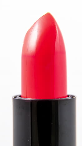 lipstick-turning-against-a-plain-white-background-in-vertical-format