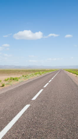 driving-in-atlas-mountains,-morocco-in-vertical