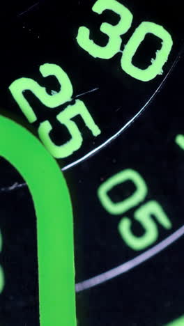 closeup-of-analogue-clock-face-in-vertical