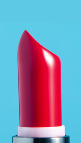 lipstick-turning-against-a-plain-white-background-in-vertical-format