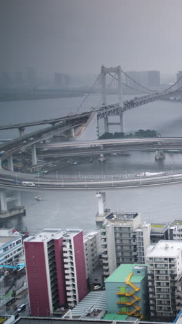 tokyo-japan-city-rainbow-bridge-skyline-harbour-vertical