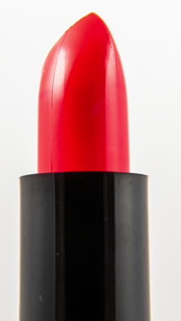 lipstick-turning-against-a-plain-white-background-in-vertical-format