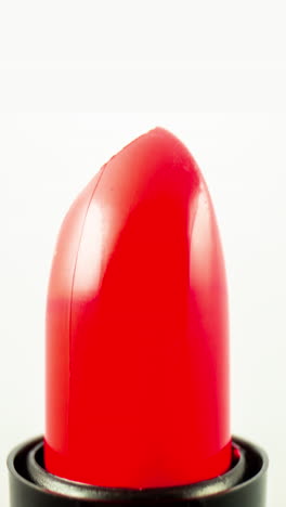 lipstick-turning-against-a-plain-white-background-in-vertical-format