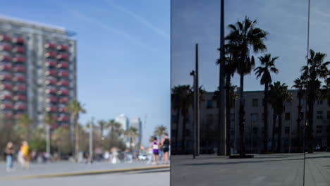 Menschen-Am-Strand-Von-Barcelona-Im-Spiegel-Reflektiert