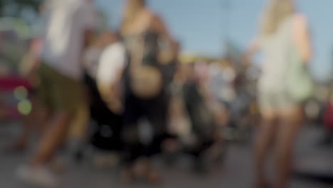 A-blurred-crowd-walking-at-a-funfair