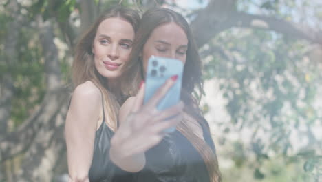 Identical-twins-with-mobile-phone-for-selfies